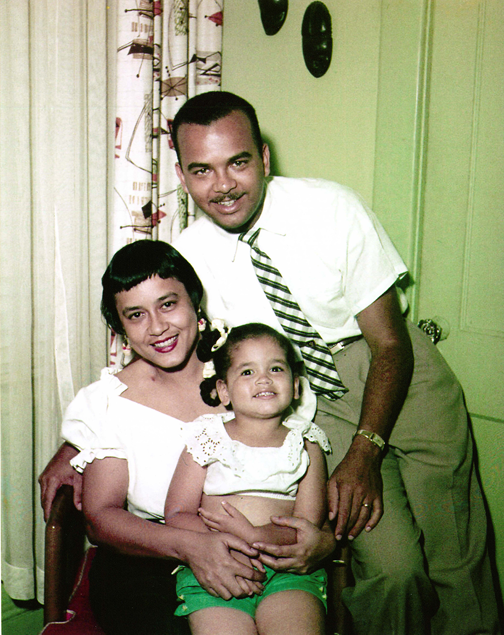 Cheryl with her parents in a photo taken by Ed Hubbard at his home in 1955.