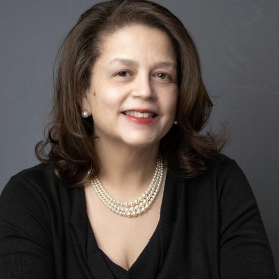 Headshot of Dr. Cheryl D. Holmes Miller wearing a black top. Image courtesy of Dr. Cheryl D. Holmes Miller.